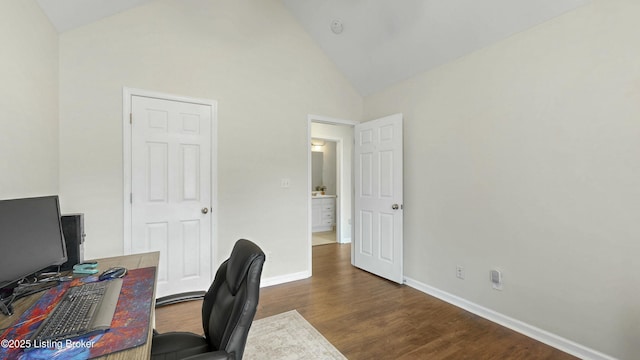 home office featuring high vaulted ceiling, baseboards, and dark wood finished floors