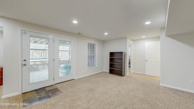 doorway with carpet, baseboards, and recessed lighting