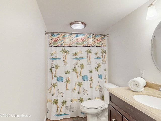 full bathroom with vanity, toilet, and a shower with curtain