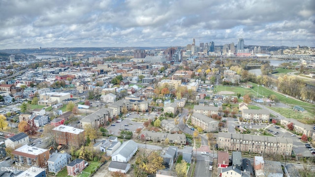 birds eye view of property with a view of city