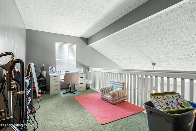 carpeted office space featuring a textured ceiling and lofted ceiling