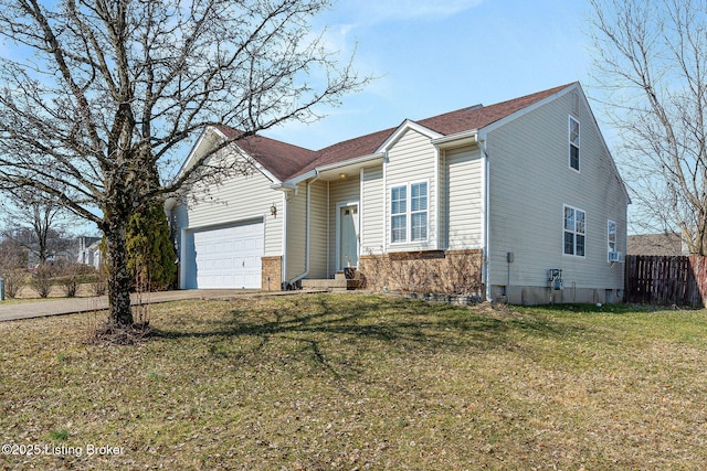 single story home with a front lawn, fence, driveway, and an attached garage