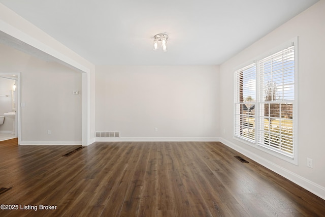 1523 Yorkshire Dr, Elizabethtown, KY 42701 - unfurnished room with dark wood-style flooring, visible vents, and baseboards