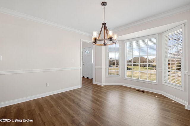 1523 Yorkshire Dr, Elizabethtown, KY 42701 - unfurnished dining area with dark wood-type flooring, plenty of natural light, and ornamental molding
