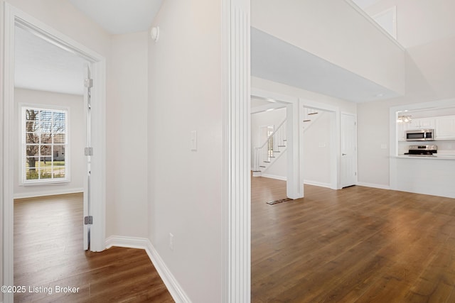 1523 Yorkshire Dr, Elizabethtown, KY 42701 - hall with stairway, dark wood-style flooring, visible vents, and baseboards