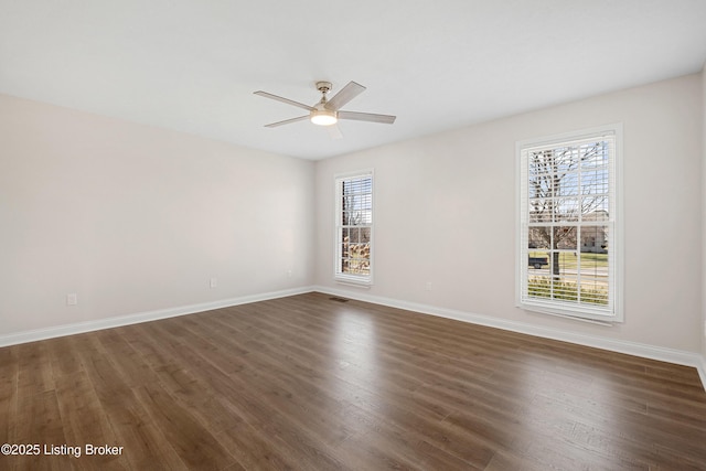 1523 Yorkshire Dr, Elizabethtown, KY 42701 - spare room with ceiling fan, dark wood finished floors, visible vents, and baseboards
