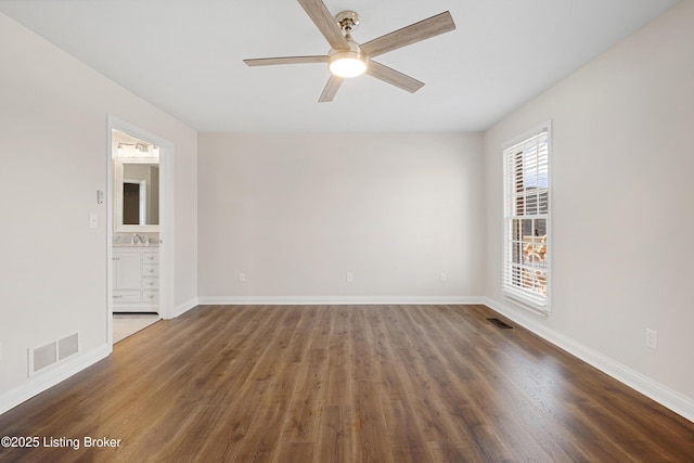 1523 Yorkshire Dr, Elizabethtown, KY 42701 - spare room with visible vents, a sink, and wood finished floors