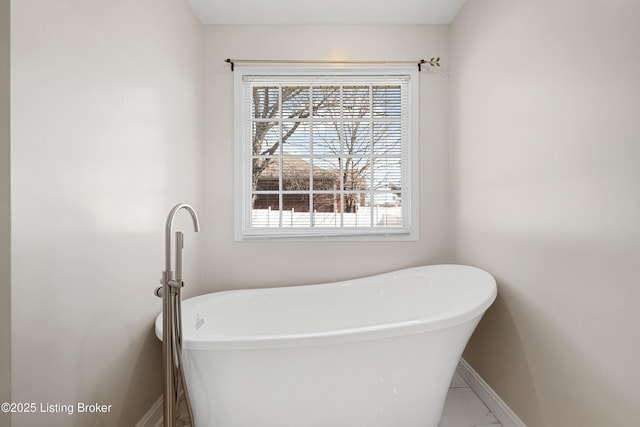 1523 Yorkshire Dr, Elizabethtown, KY 42701 - full bath with baseboards and a freestanding bath