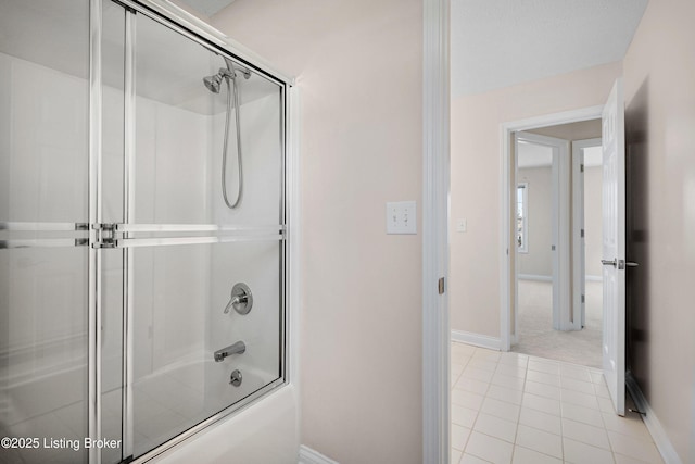 1523 Yorkshire Dr, Elizabethtown, KY 42701 - bathroom with shower / bath combination with glass door, tile patterned flooring, and baseboards