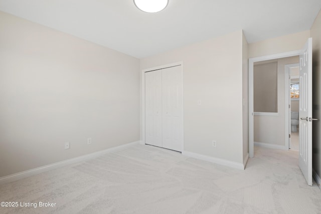 1523 Yorkshire Dr, Elizabethtown, KY 42701 - unfurnished bedroom with a closet, light colored carpet, and baseboards