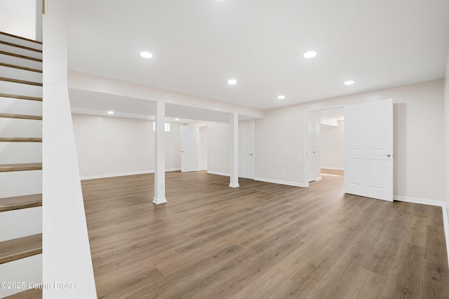 1523 Yorkshire Dr, Elizabethtown, KY 42701 - finished basement featuring stairs, baseboards, wood finished floors, and recessed lighting