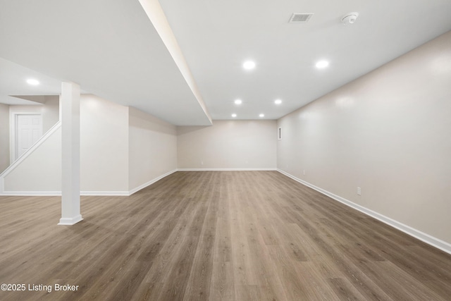 1523 Yorkshire Dr, Elizabethtown, KY 42701 - finished basement with recessed lighting, wood finished floors, visible vents, and baseboards