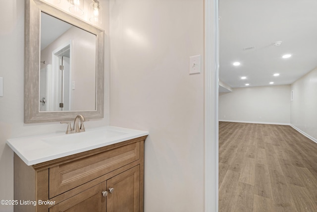 1523 Yorkshire Dr, Elizabethtown, KY 42701 - bathroom featuring recessed lighting, wood finished floors, vanity, and baseboards