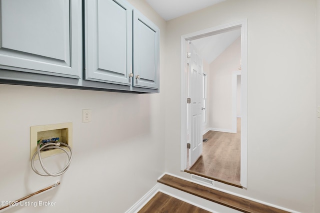 1523 Yorkshire Dr, Elizabethtown, KY 42701 - clothes washing area with cabinet space, visible vents, baseboards, dark wood-style flooring, and hookup for a washing machine