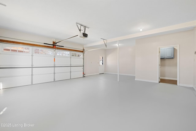1523 Yorkshire Dr, Elizabethtown, KY 42701 - garage with a garage door opener and baseboards