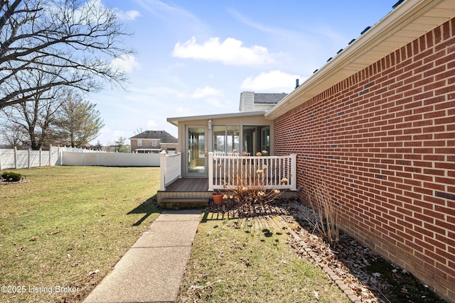 1523 Yorkshire Dr, Elizabethtown, KY 42701 - exterior space featuring fence private yard, a sunroom, and a deck