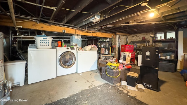 unfinished below grade area with independent washer and dryer