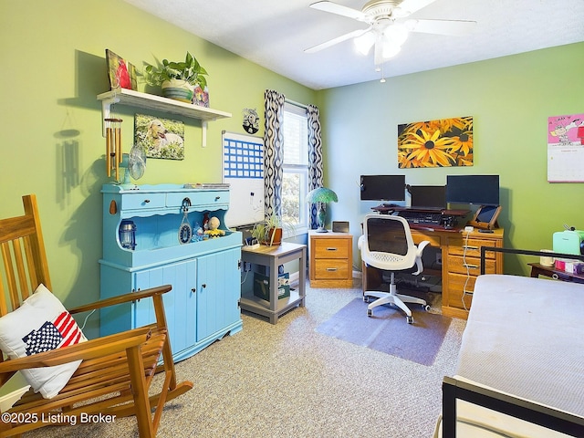 office space featuring ceiling fan and carpet flooring