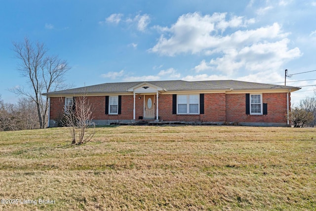 ranch-style house featuring brick siding and a front yard