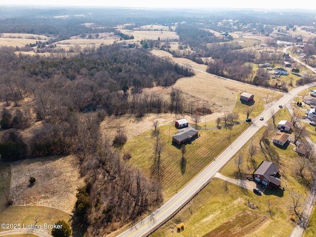 birds eye view of property featuring a rural view