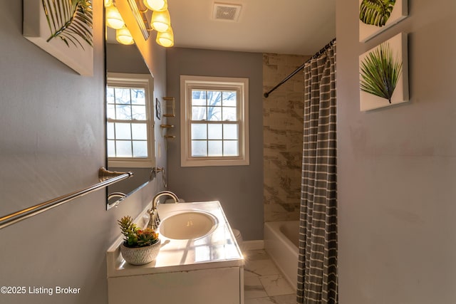 full bath with marble finish floor, shower / tub combo, vanity, and visible vents