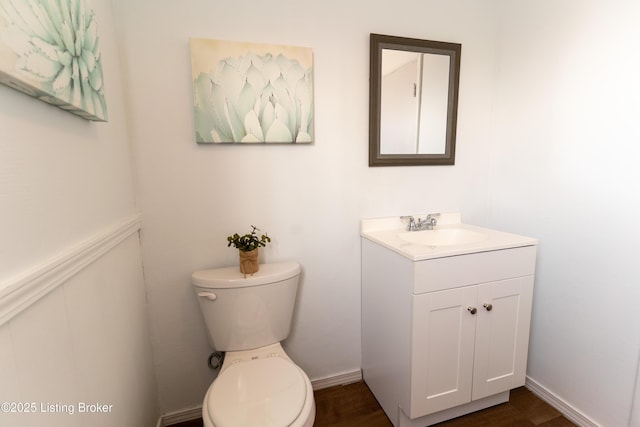 half bath with toilet and vanity