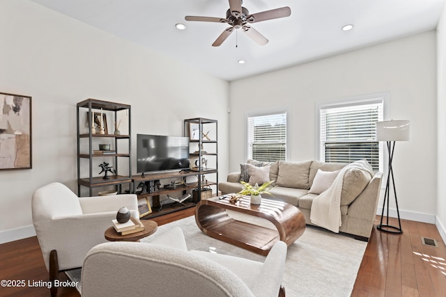 living room with baseboards, visible vents, ceiling fan, hardwood / wood-style floors, and recessed lighting