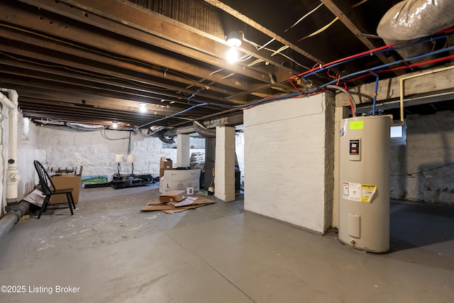 basement featuring electric water heater