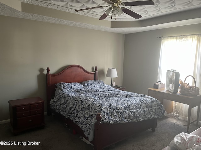 bedroom with carpet and a ceiling fan