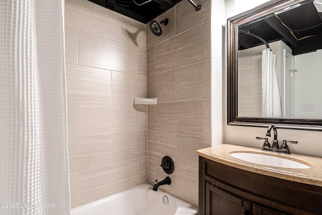 bathroom featuring vanity and shower / bath combo with shower curtain