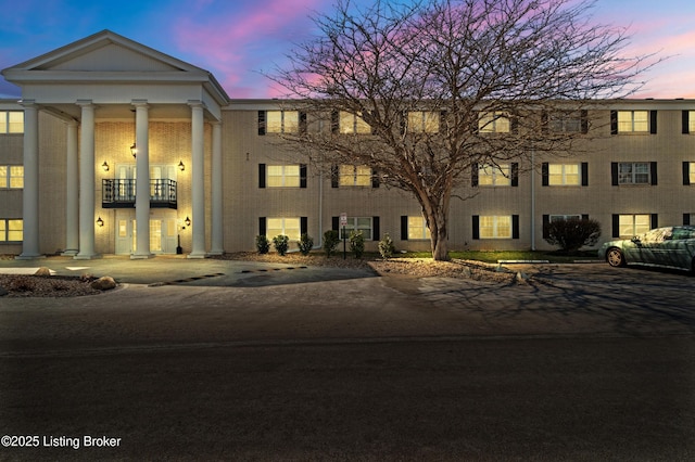 view of property at dusk