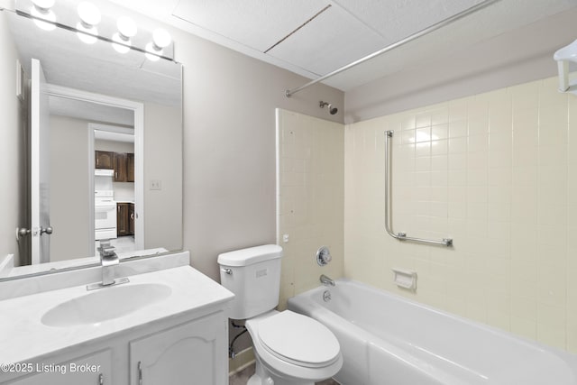 full bathroom with toilet, vanity, and shower / tub combination