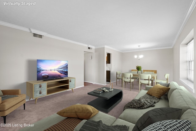 living area featuring ornamental molding, carpet, visible vents, and an inviting chandelier