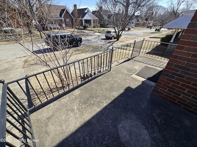 balcony featuring a residential view