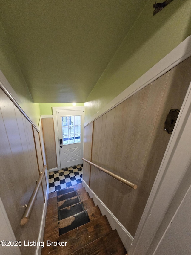 stairs featuring tile patterned floors