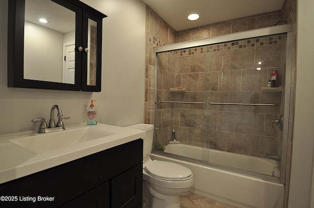 bathroom with toilet, enclosed tub / shower combo, tile patterned flooring, vanity, and recessed lighting