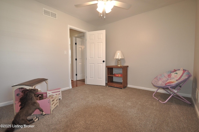 playroom with carpet floors, visible vents, baseboards, and a ceiling fan