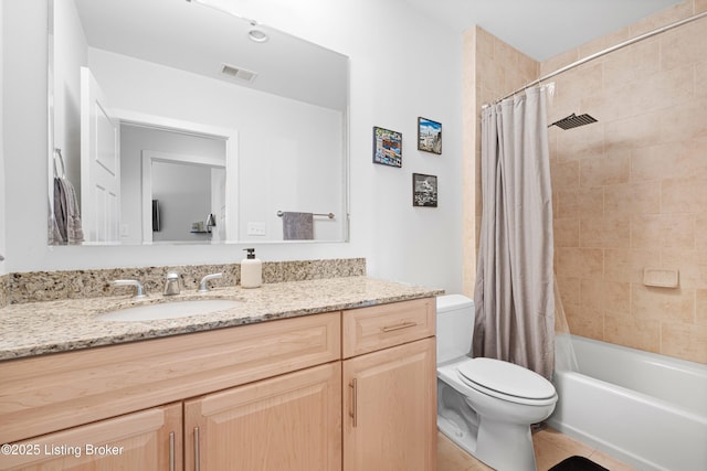 bathroom featuring visible vents, toilet, tile patterned flooring, shower / bath combination with curtain, and vanity