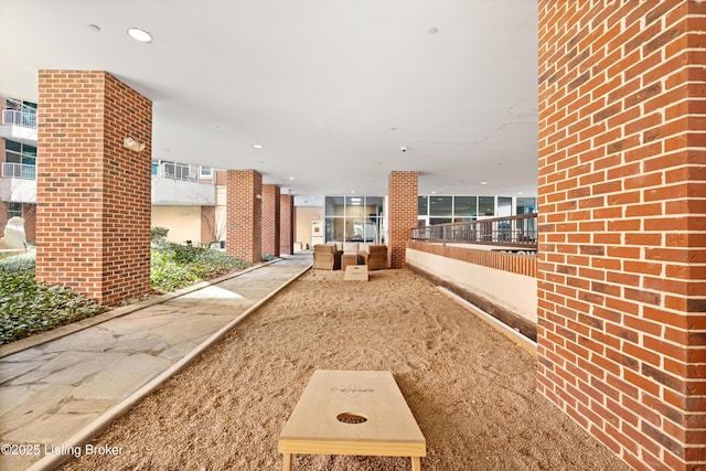 view of home's community featuring outdoor lounge area