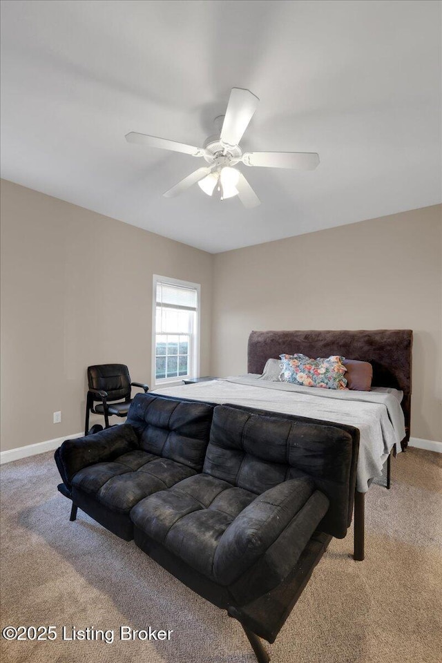 bedroom with carpet floors, ceiling fan, and baseboards