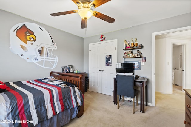 bedroom with baseboards, a ceiling fan, and light colored carpet