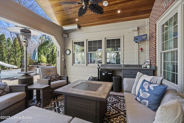 view of patio featuring ceiling fan and an outdoor hangout area