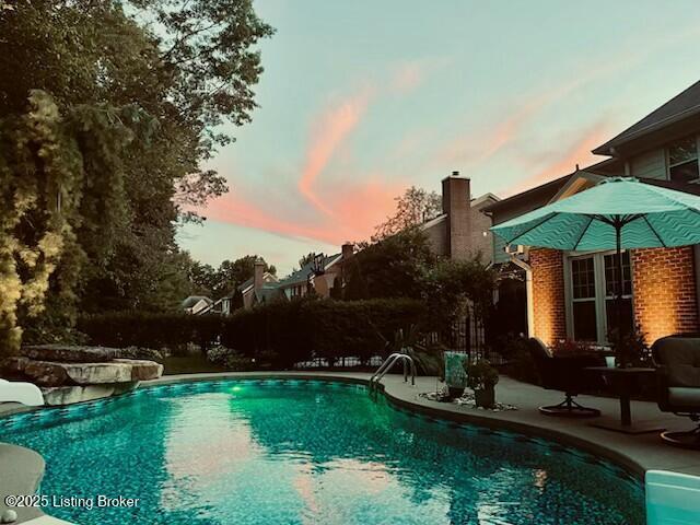 pool with a patio