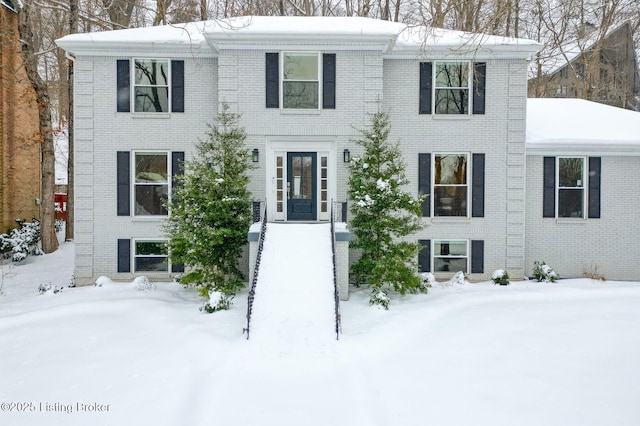 colonial house with brick siding