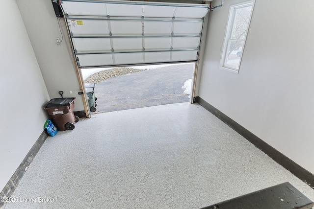 garage with baseboards