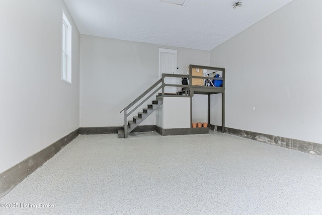 below grade area featuring baseboards