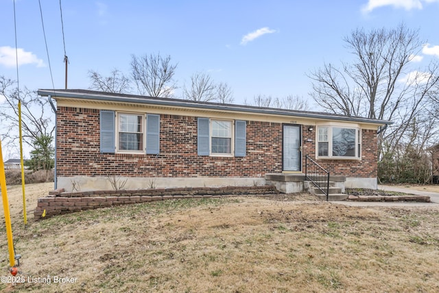 ranch-style house with brick siding