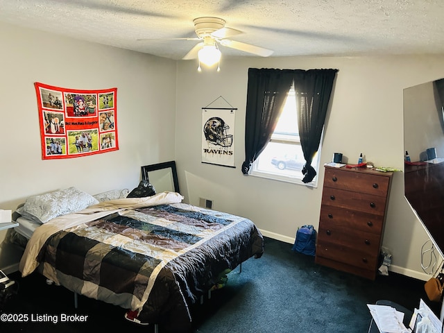 bedroom featuring visible vents, carpet flooring, a textured ceiling, and baseboards