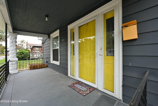 entrance to property with covered porch