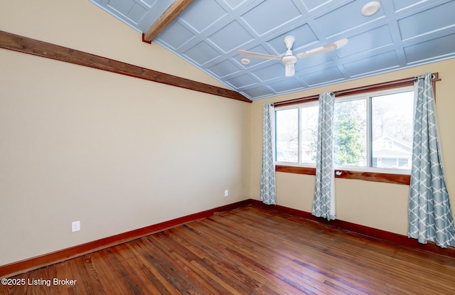 spare room with baseboards, coffered ceiling, hardwood / wood-style flooring, ceiling fan, and vaulted ceiling with beams